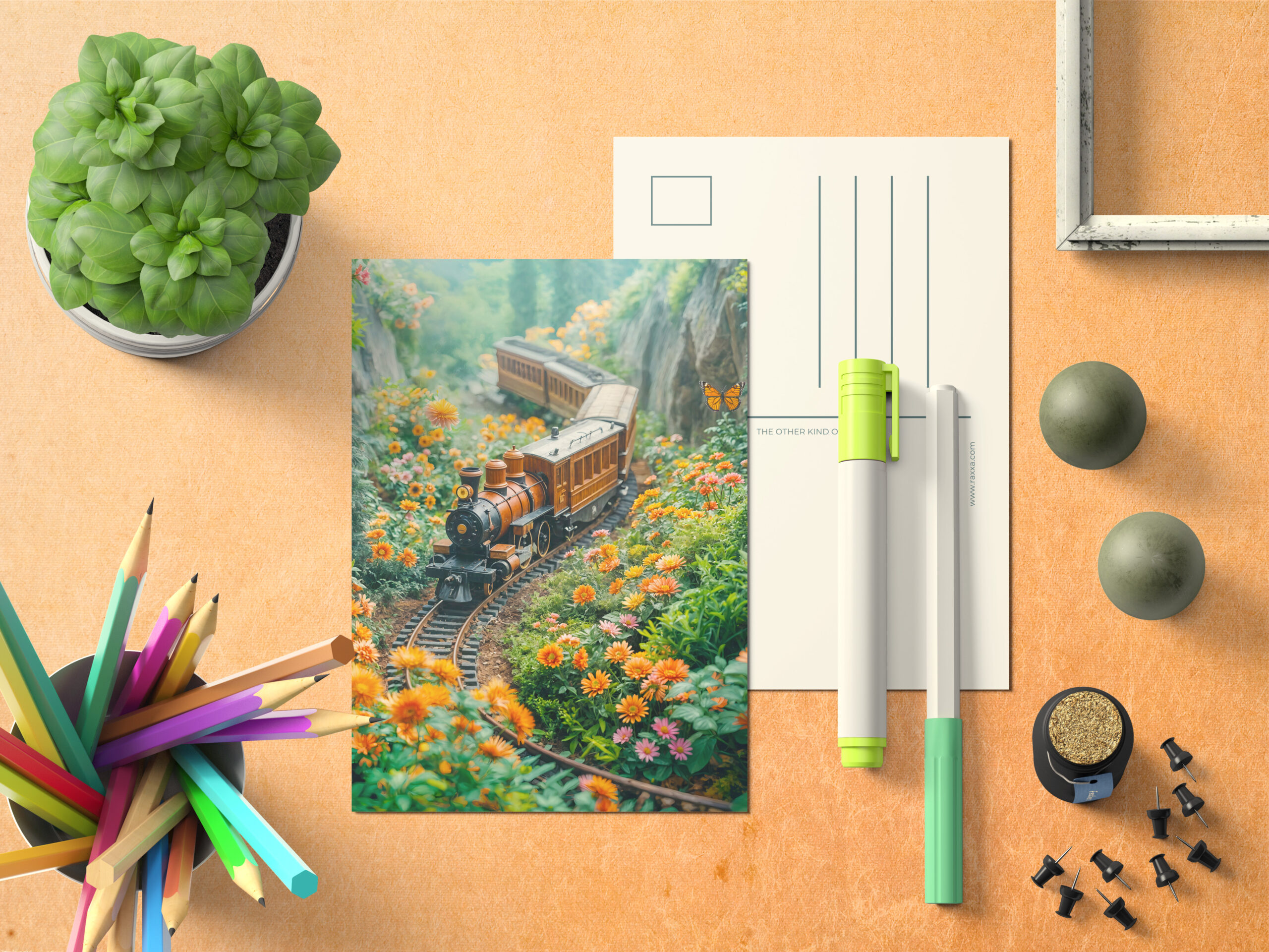 raxxa Postkarte: Miniature train in vibrant mountain meadow
